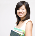 Asian female student holding book