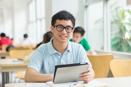 Chinese boy in glasses geeky