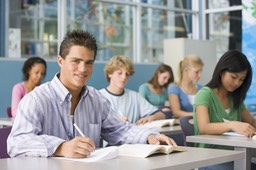 Italian male student front of class